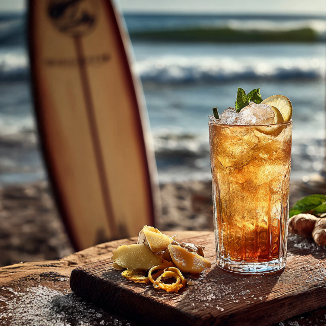 Golden Spiced Rum cocktail on the surfing beach 